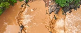 Overhead perspective reveals powerful sediment floodwaters