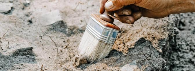 Archaeologist working on site 