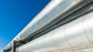 Silver pipelines against some blue sky