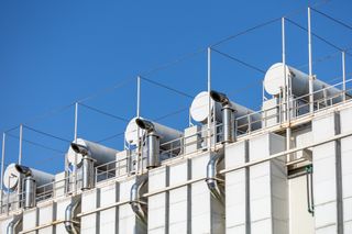 Ventilation pipes on the facade of computer data center